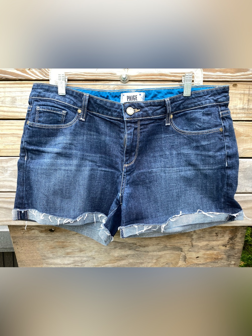 PAIGE Indigo Frayed Hem Denim Shorts